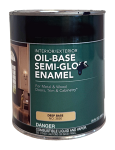 Metal paint can with a green label that says "OIL-BASE SEMI-GLOSS ENAMEL"
