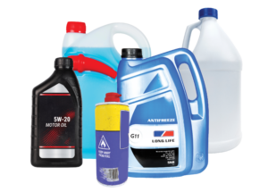 Various types of household hazardous waste - 5 plastic bottles of various poisonous or corrosive liquids and one metal can of spray fluid.