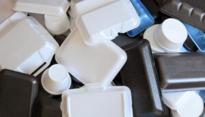 Top view of a pile of polystyrene foam - black, white, and blue.